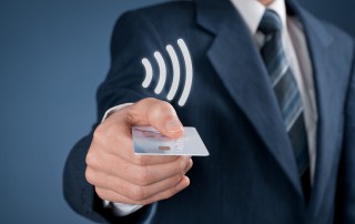contactless card being handed to you by man in suit