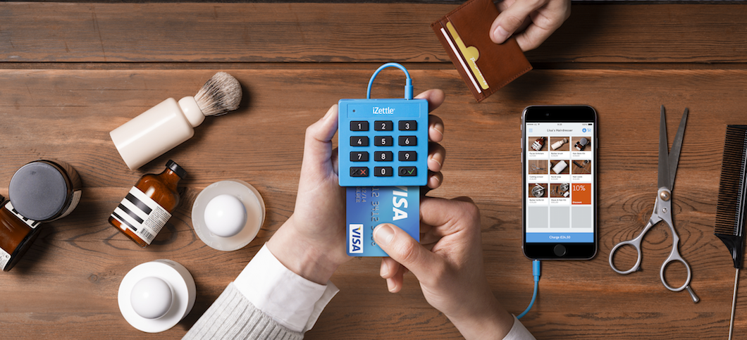 iZettle Lite card reader with chip card and connected to iPhone iZettle Lite card reader with chip card and connected to iPhone