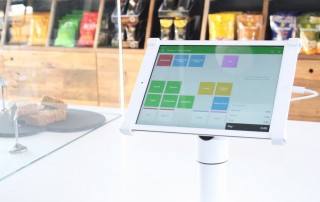 Vend POS on iPad placed in tablet stand on countertop