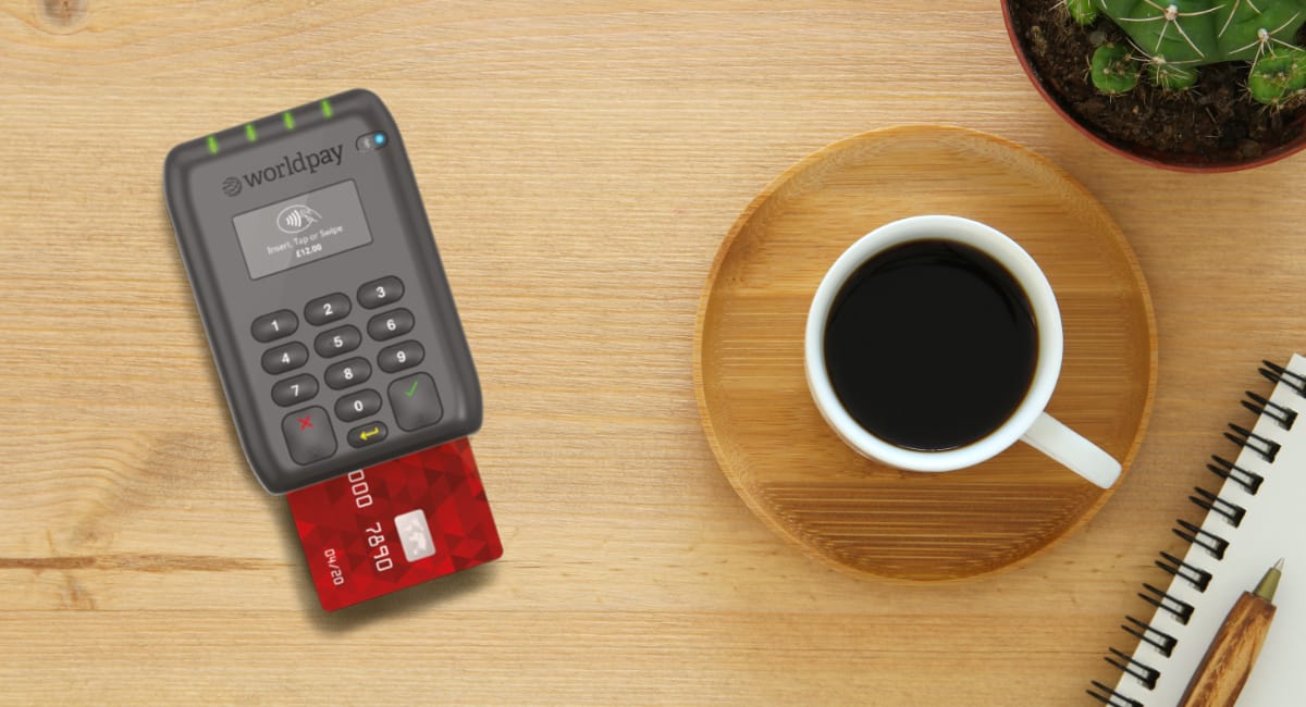 Worldpay Reader on a cafe table Worldpay Reader on a cafe table