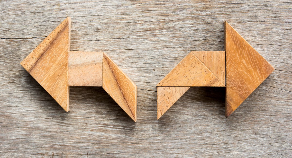 wooden arrows point left and right