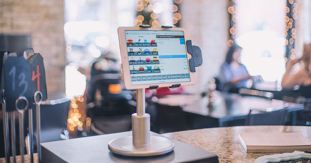 TouchBistro iPad on a restaurant counter TouchBistro iPad on a restaurant counter