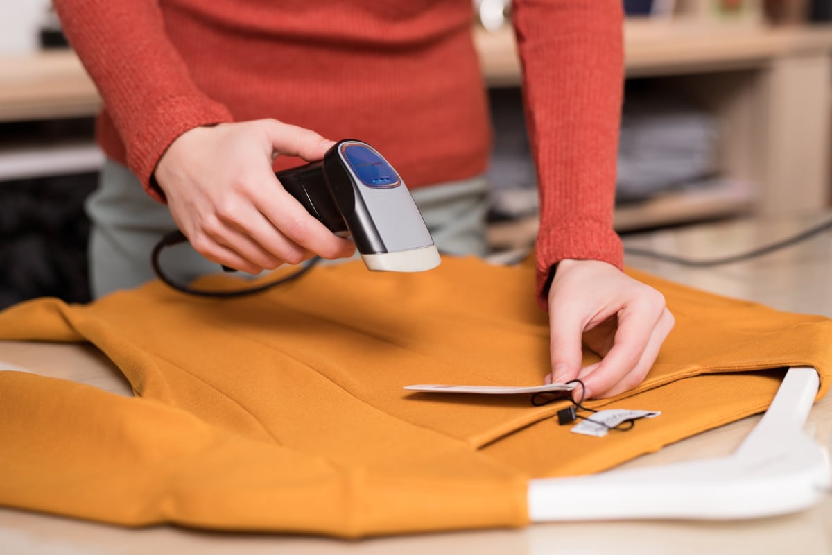 Barcode scanner clothes shop Barcode scanner used for clothing label