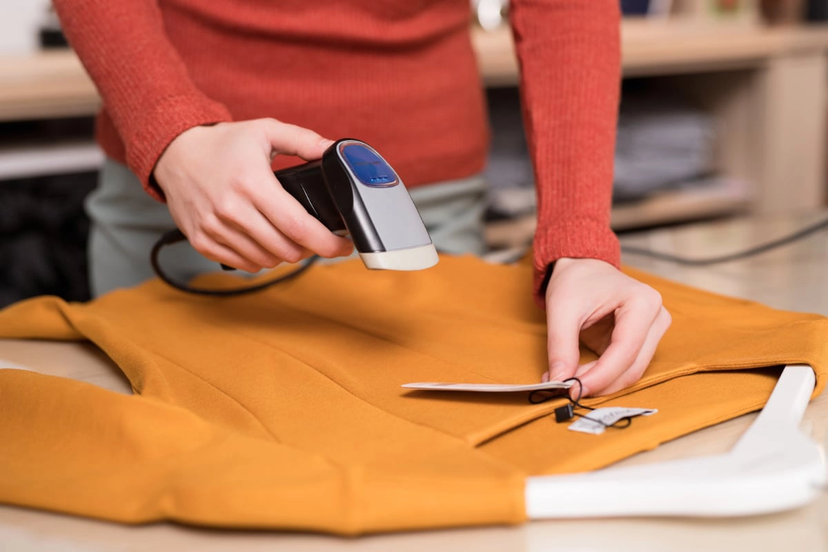 Barcode scanner clothes shop Barcode scanner used for clothing label