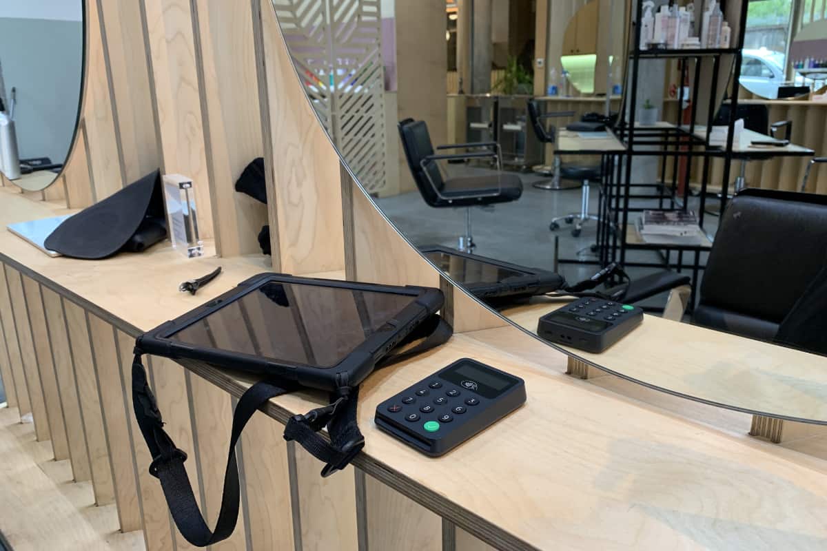 Black iZettle Reader in Kennaland beauty salon in London mobile hairdresser card machine