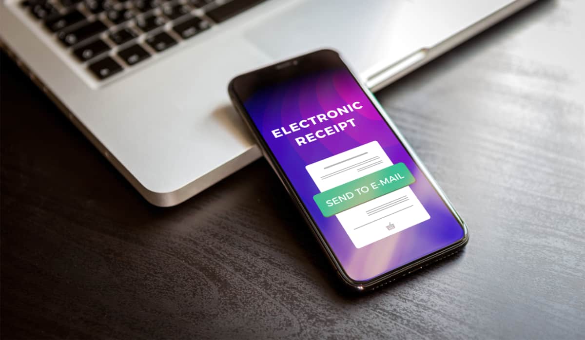 Digital receipt on phone and laptop digital receipt on phone