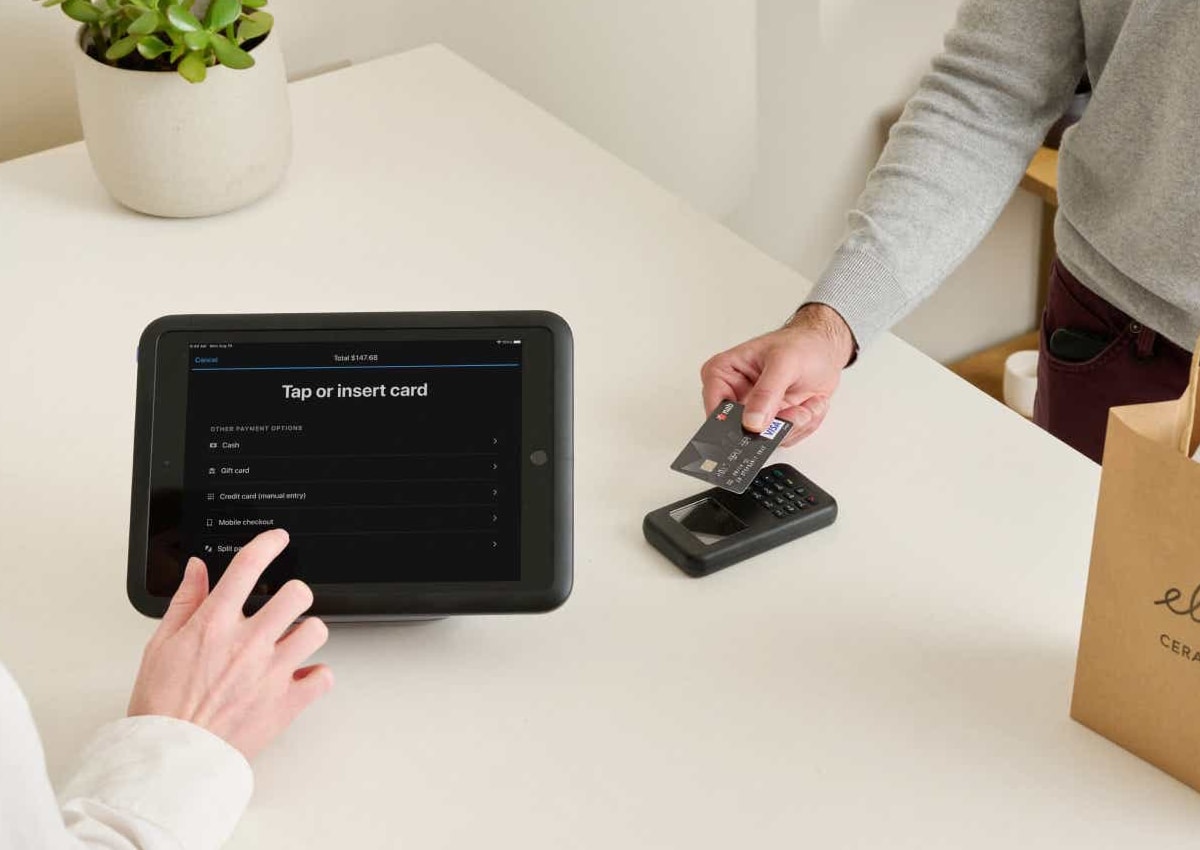 Shopify POS reader at a till point Shopify POS reader at till point