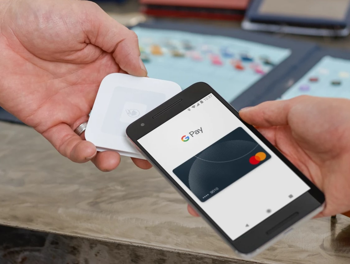 Square Reader taking a Google Pay payment Square Reader taking mobile wallet payment