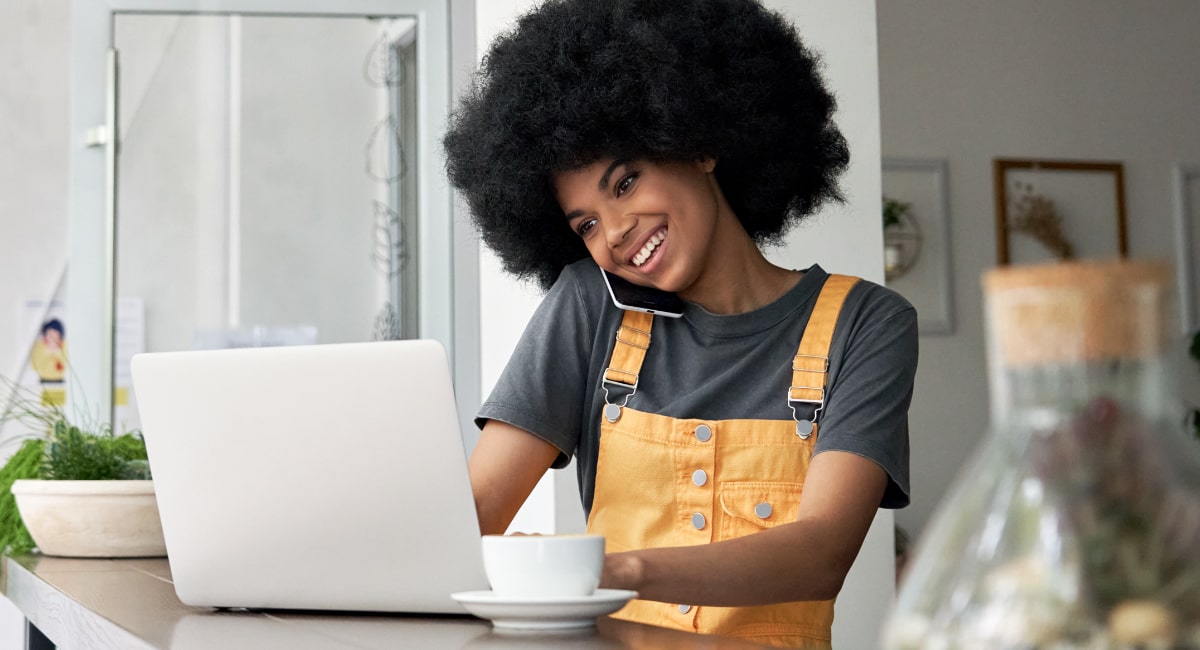 woman taking phone payment