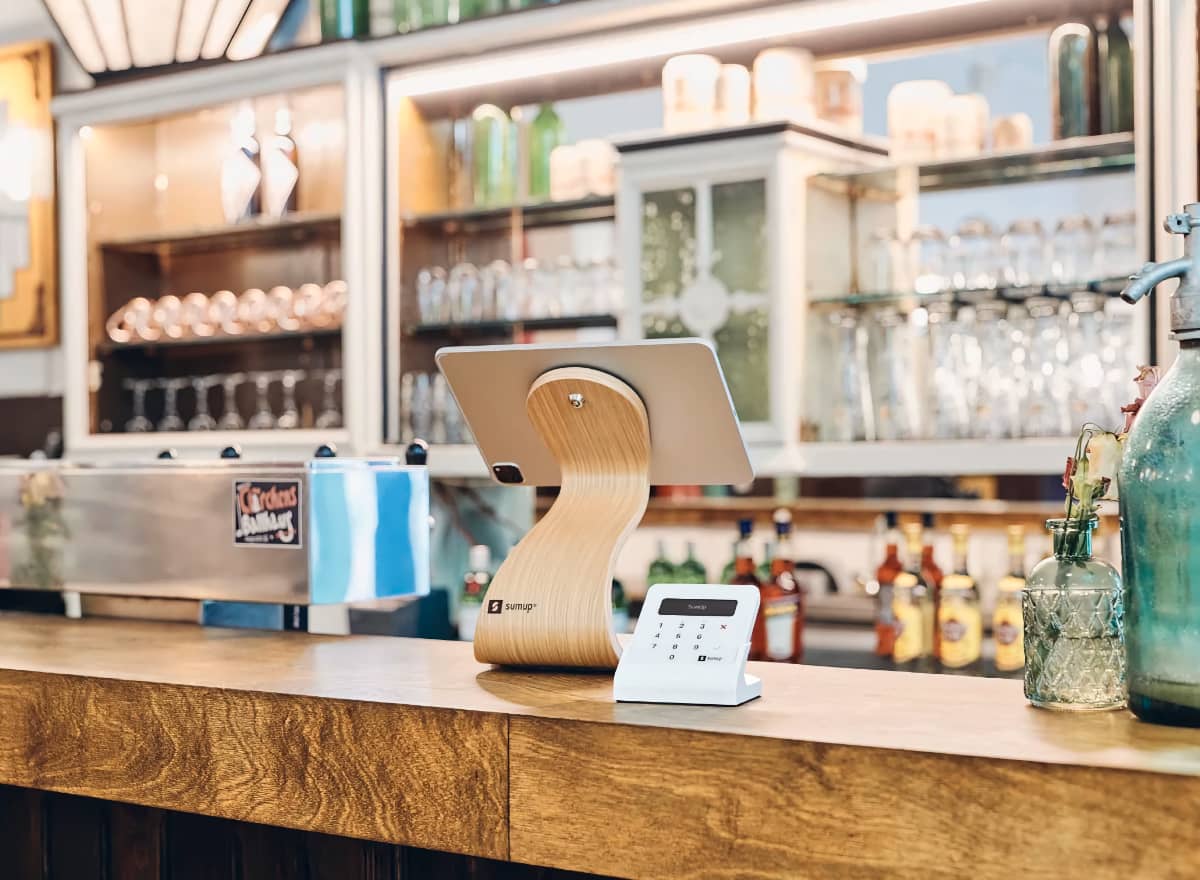 SumUp Point of Sale setup in a bar SumUp POS iPad stand and reader in bar