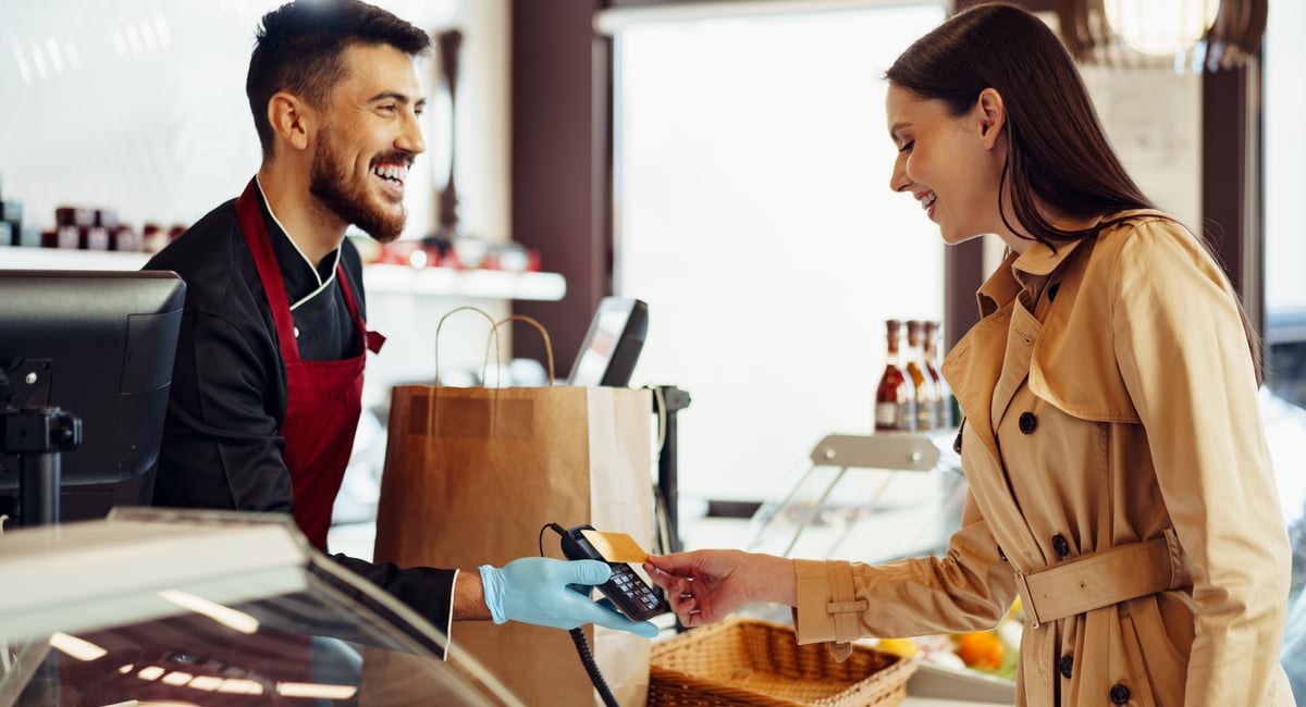 deli shop checkout with card machine