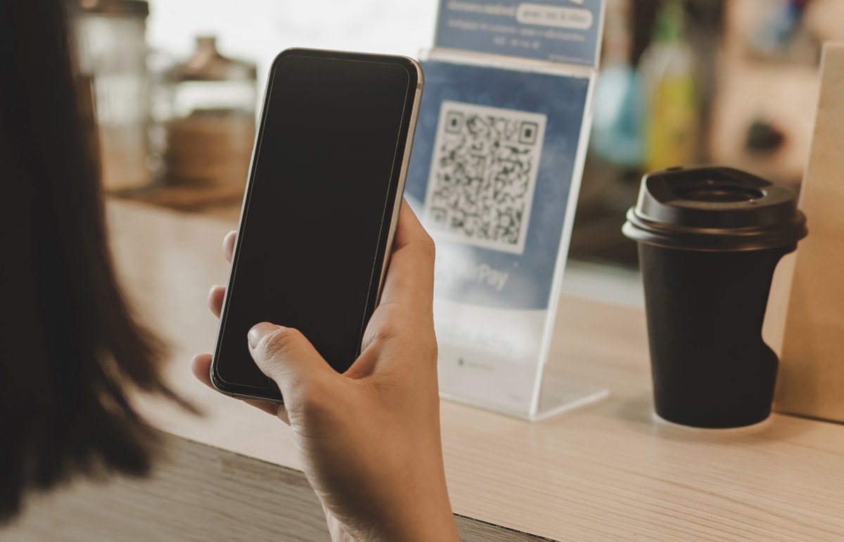 QR code payments are a great alternative to card machine payments QR code payment at counter