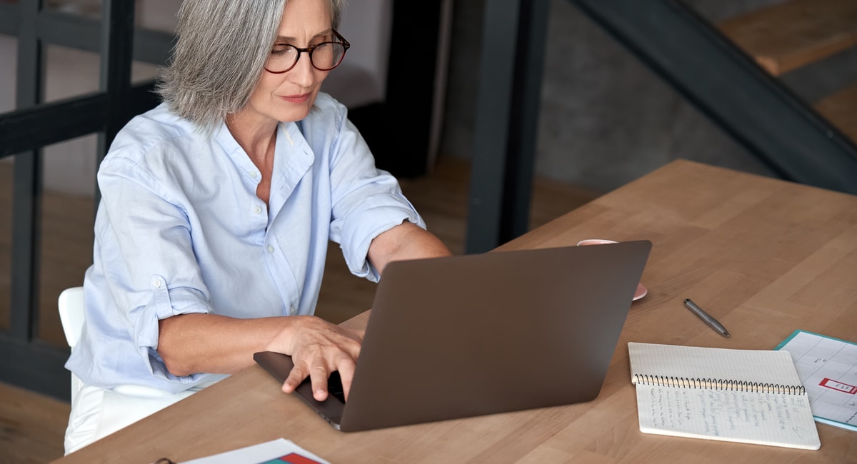 freelance woman working on laptop