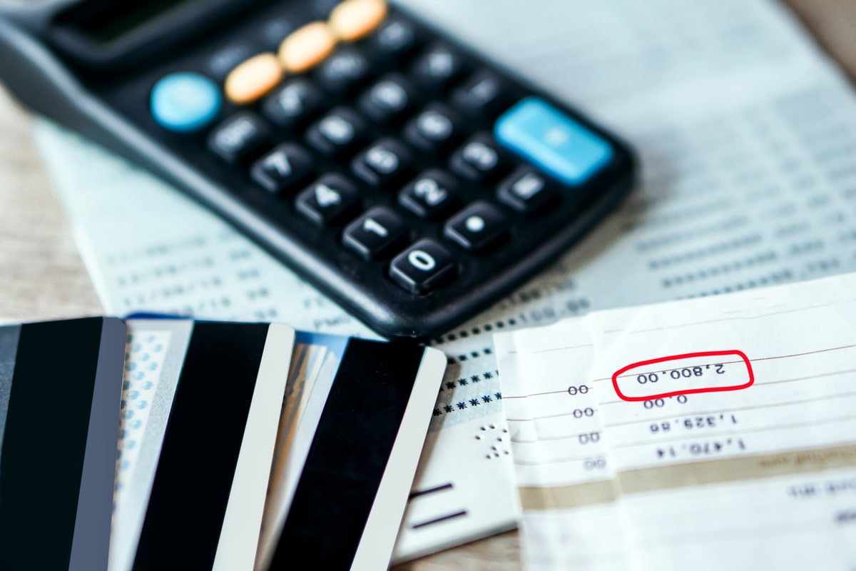 Different card types have different rates payment cards next to calculator and statement