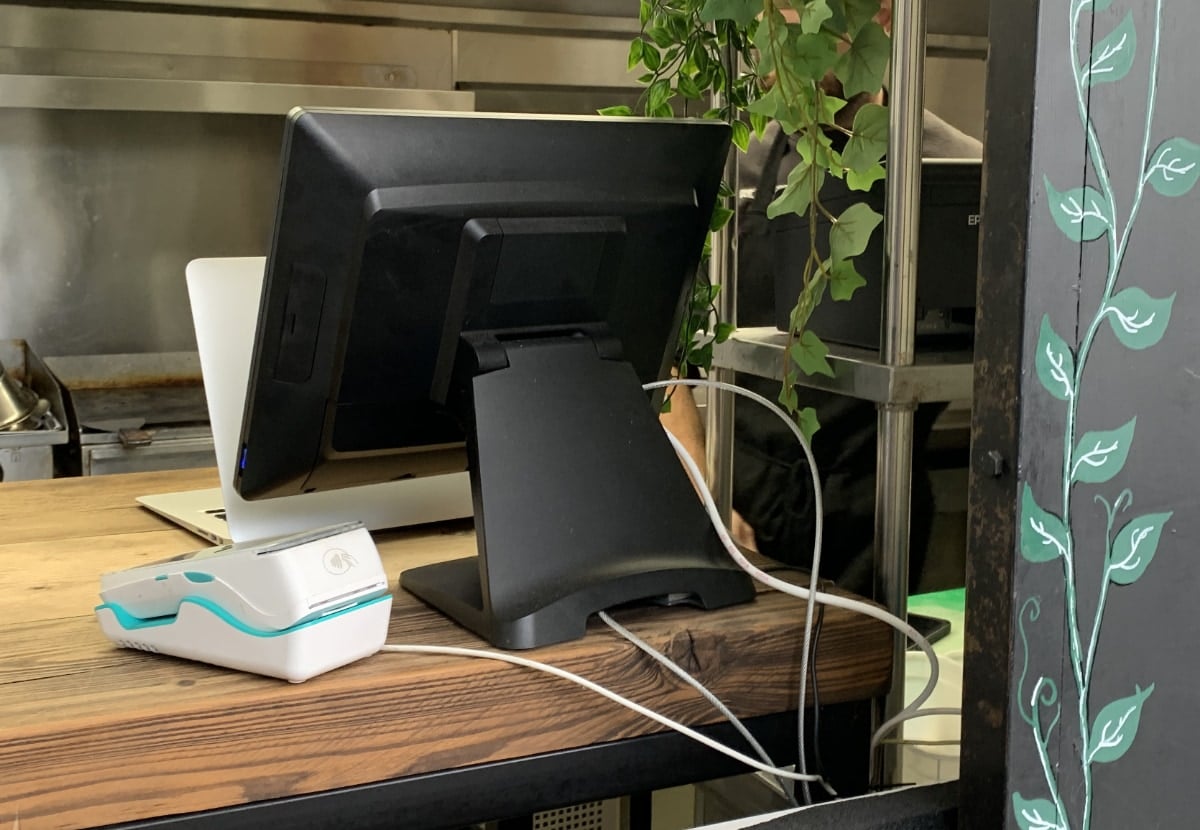 Dojo Go on at a restaurant till in London Dojo Go on till counter