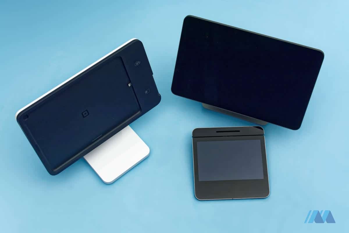 The new Square Stand next to Square Register Square Stand and Square Register