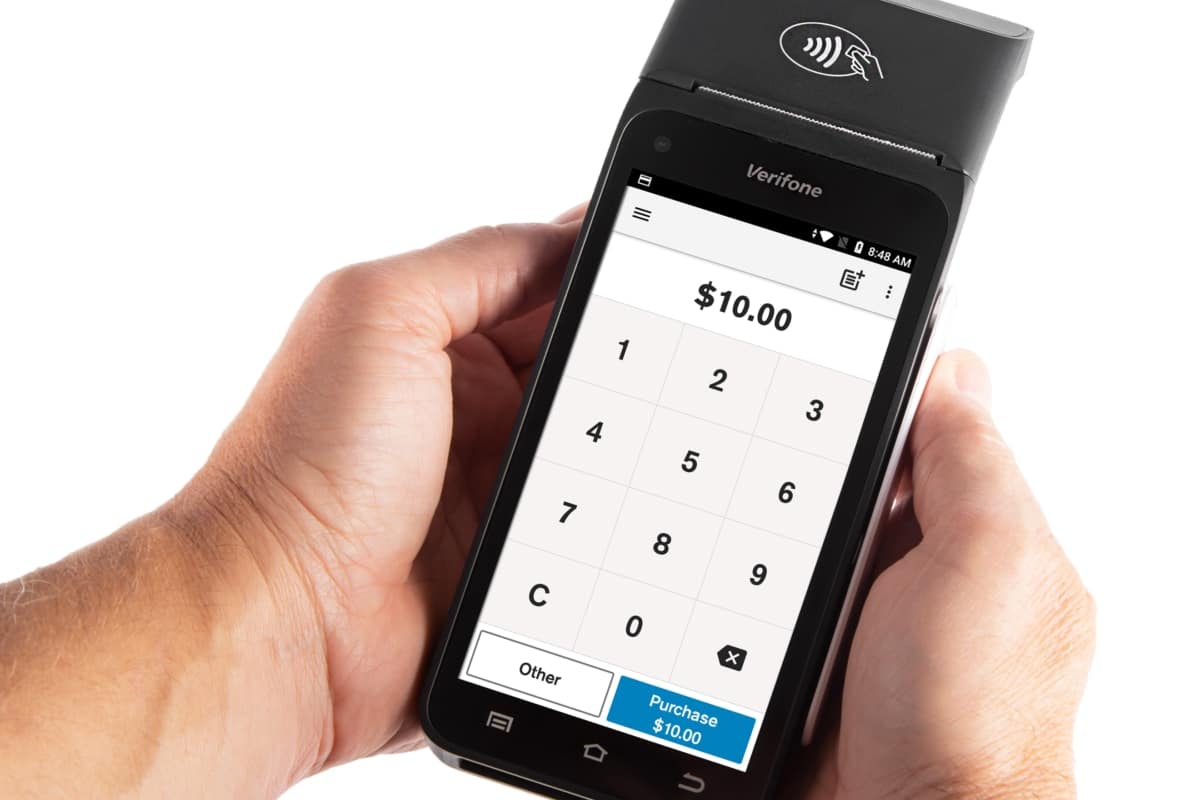 PayNuts’ Verifone T650p terminal in use PayNuts portable EFTPOS terminal in hands