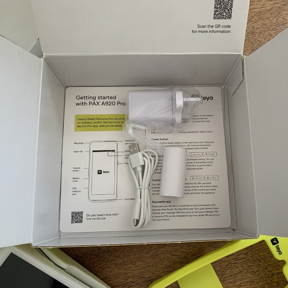 The Teya box also contains an adaptor, charging cable and receipt roll Teya box contents including adaptor, receipt roll and cable