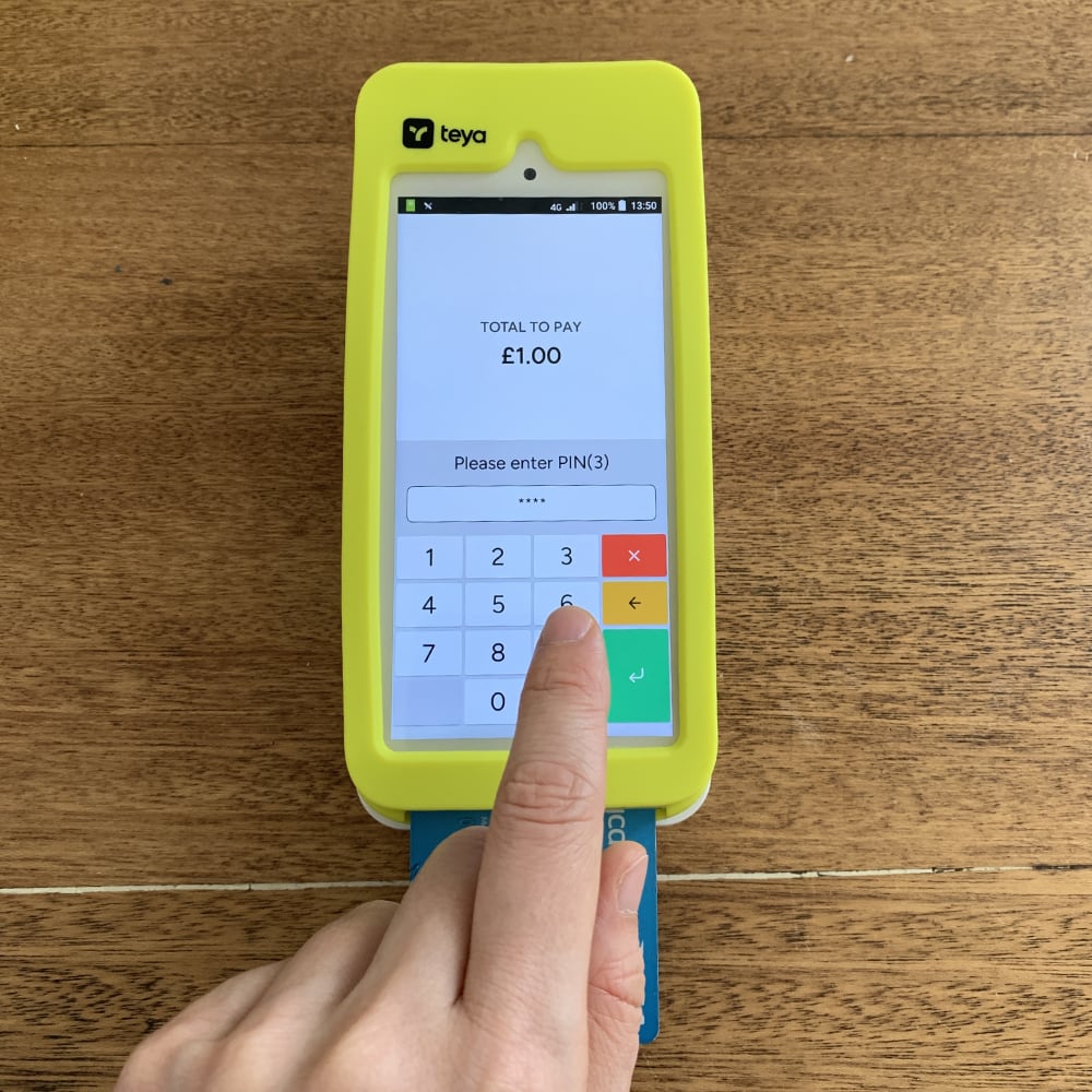 Teya’s PIN pad is virtual on the touchscreen Hand entering a PIN code on a Teya card machine