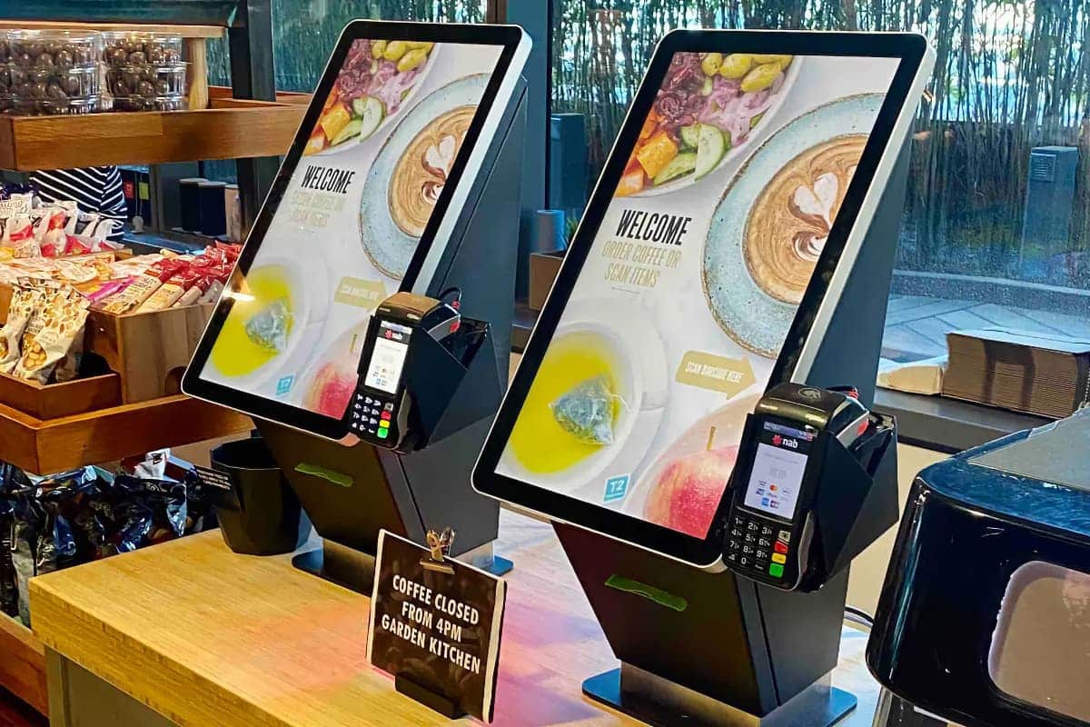 Intouch kiosks at a food business in Australia Intouch self-checkout kiosks among food products